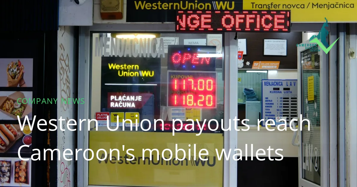 A Western Union money transfer office front with an illuminated open sign and exchange-rate display